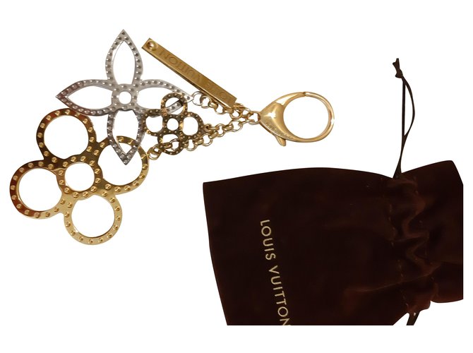 Louis Vuitton Bag charms Golden Metallic Bronze Metal  ref.206605