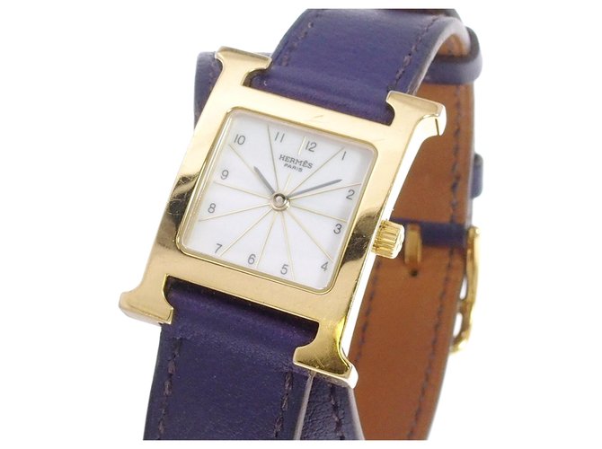 Hermès Reloj Hermes Gold H de Bourtour Dorado Púrpura Cuero Acero Metal Becerro  ref.207949