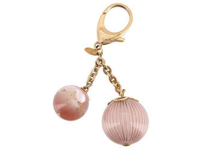 Louis Vuitton Gold Bag Charm Pink Golden Metal  ref.208659