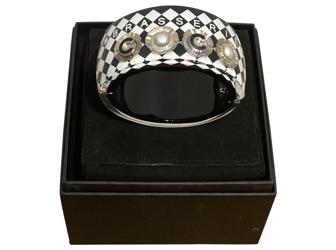 Chanel Bracelets Black White Golden Resin  ref.209248