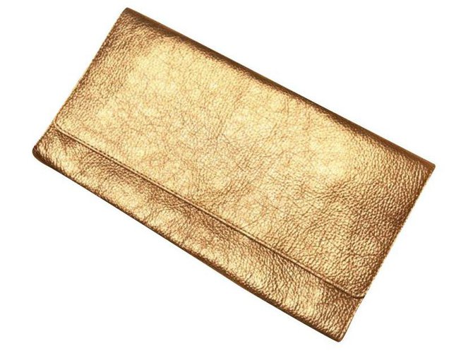 Gerard Darel Gérard Darel Clutch aus goldenem Kalbsleder  ref.209693