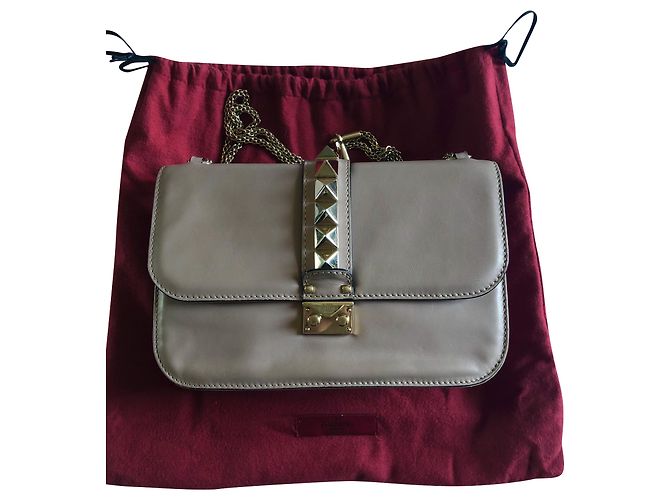 Bolsa de mão Valentino Glam Lock em couro rosa