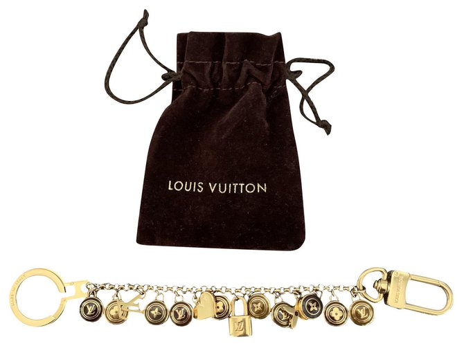 Louis Vuitton Bag charms Gold hardware Metal ref.210928 - Joli Closet