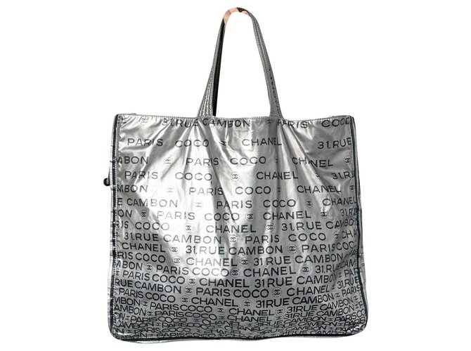 Chanel Printed Nylon Unlimited Bowling Bag Silvery Cloth ref.1066779 - Joli  Closet
