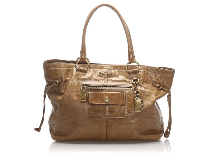 Prada Brown Saffiano Cuir Panier lined Handbag Beige Leather Pony-style  calfskin ref.620041 - Joli Closet