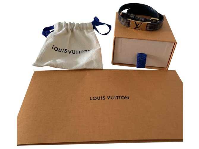 Louis Vuitton Unterschreib es Braun Gold hardware Leder  ref.212822