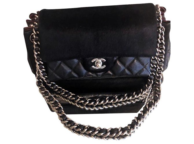 Chanel esclusiva borsa in shearling senza tempo Nero Pelle  ref.213145