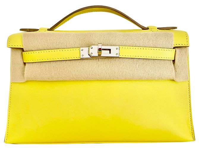Hermès Kelly clutch giallo lime