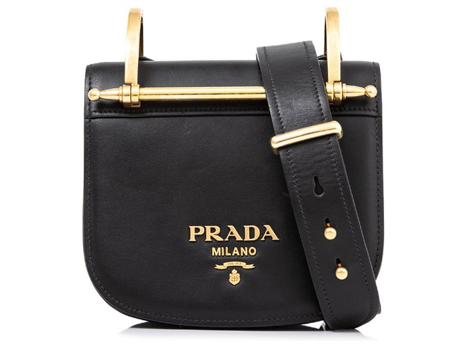 prada bolsa black and gold