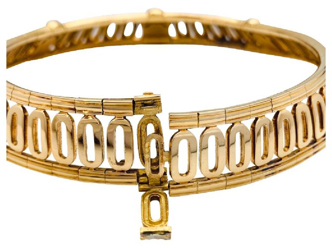 Cartier torque necklace, "Beetle", In yellow gold.  ref.214746