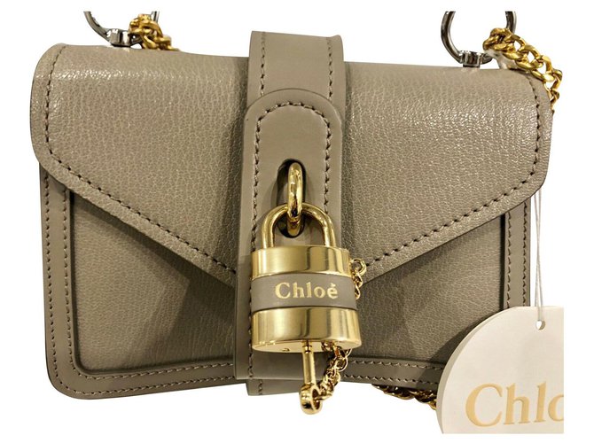 Chloé Bolso bandolera pequeño con cadena de Chloe Aby Gris Cuero  ref.216481