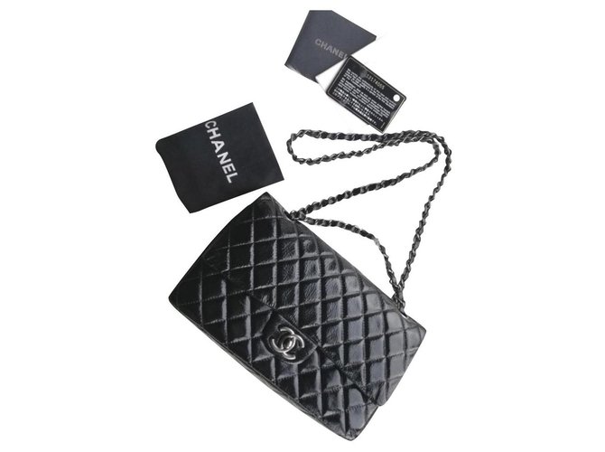 Chanel Medium Timeless classic flap bag Black Leather  ref.217975