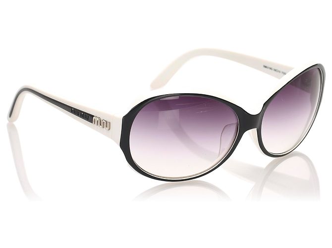 Miu Miu Schwarze runde getönte Sonnenbrille