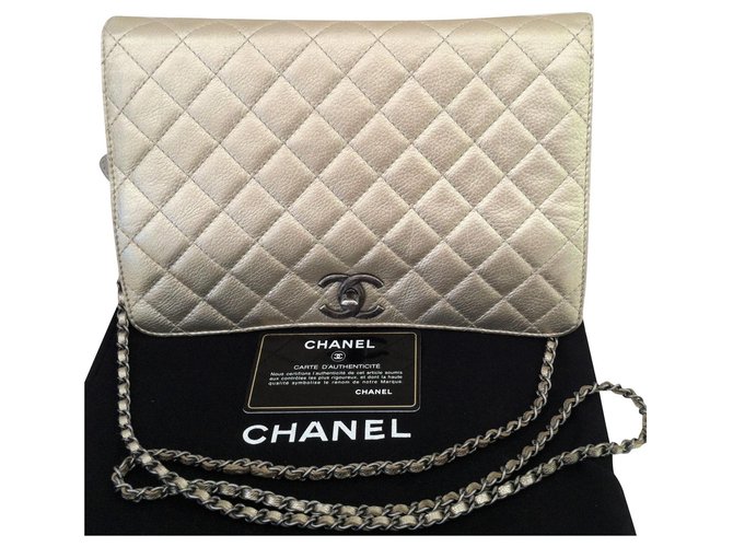 Chanel Bolsas Dourado Couro  ref.221233