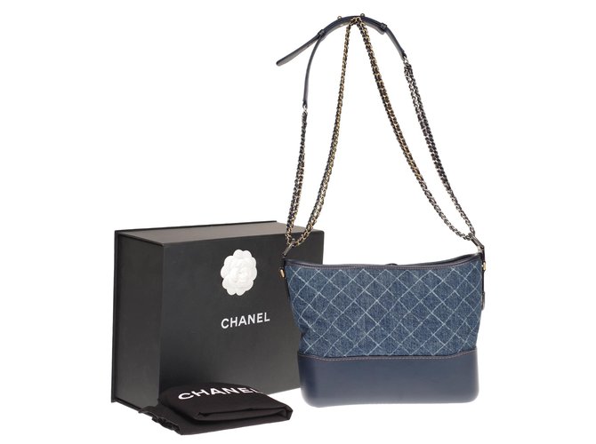 Precioso bolso de mano Chanel Gabrielle modelo pequeño en denim azul y herrajes metálicos dorados y plateados Juan  ref.221343
