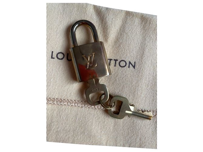 Louis Vuitton lock and 2 keys for Speedy Keepall Alma Gold hardware