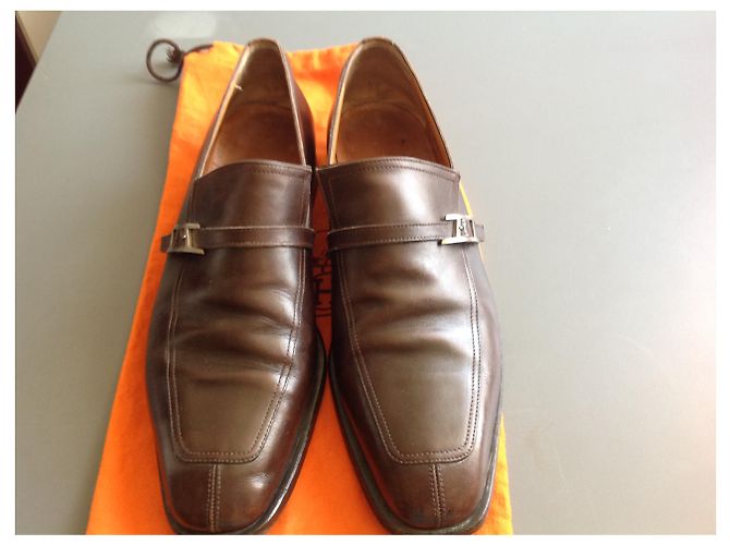 Mocassins Hermès en cuir marron avec bride H dorée