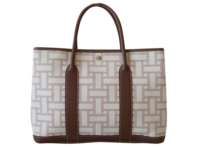 Hermès Handbags Brown Beige Leather Cloth  ref.223462