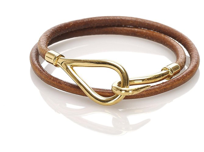 Hermès Bracelet en cuir à crochet géant Hermes marron Métal Veau façon poulain Doré  ref.224670