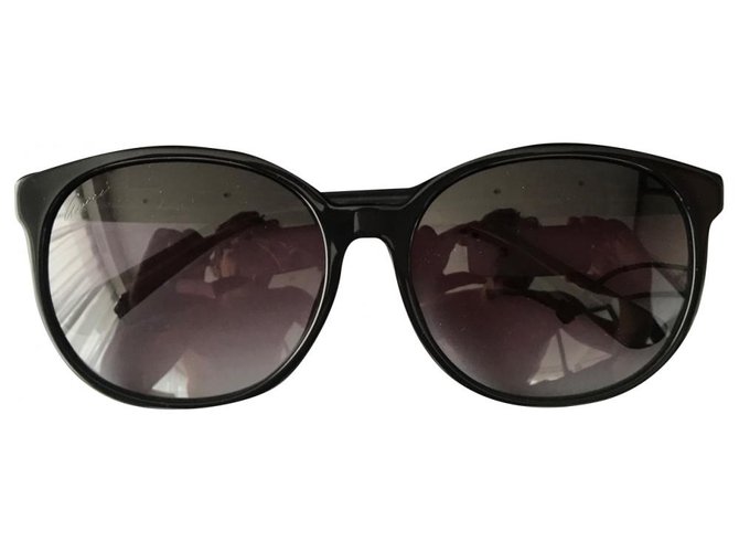 gucci black oval sunglasses