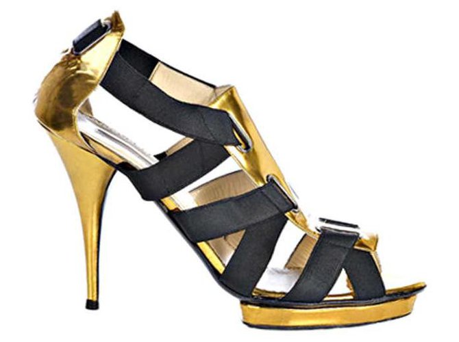 Oscar de la Renta Black and gold patent leather bandage sandals Golden Elastane  ref.225435