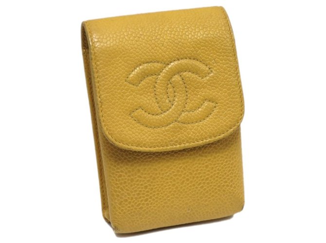 Cigarrillo Chanel Yellow CC Caviar Amarillo Cuero  ref.225912