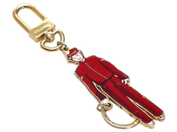 Louis Vuitton Red Groom Key Ring Bag Charm Golden Metal ref.226374 - Joli  Closet