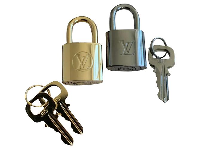 Louis Vuitton Lucchetto Argento D'oro Metallo