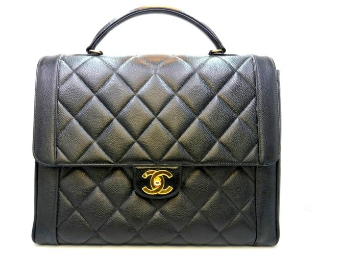 Vintage Chanel Top handle bag with 24K gold hardware Black Leather  ref.231236 - Joli Closet