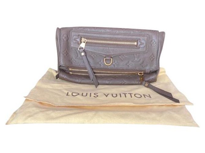 Petillante Louis Vuitton Pochette Funkelndes Leder Empreinte Terre (Braun)  ref.232876