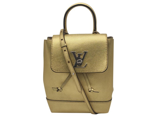 Lockit Bolso Louis Vuitton Lokme en cuero dorado  ref.233639