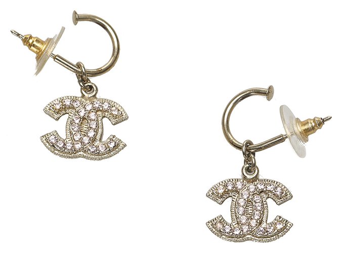 Chanel Gold CC Rhinestone Drop Earrings White Golden Metal Plastic  ref.233762 - Joli Closet