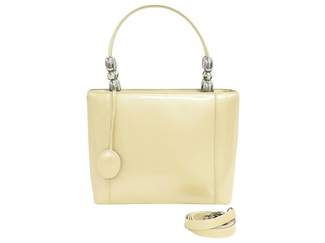 DIOR handbag Beige Patent leather  ref.233958