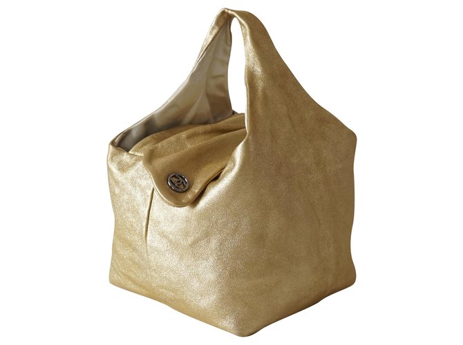 Chanel Handbags Golden Leather  ref.234577