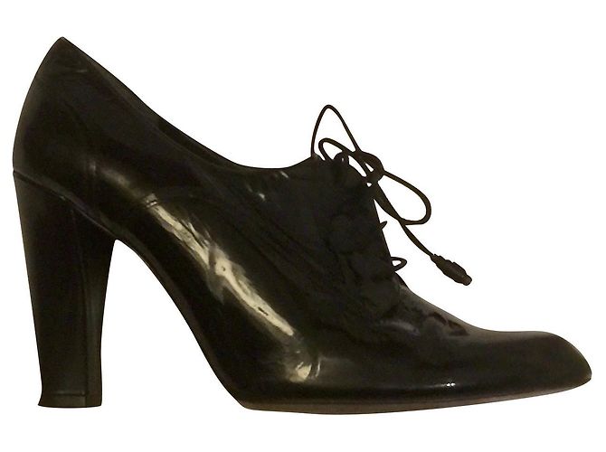 Stuart Weitzman Black patent booties with stacked heel
