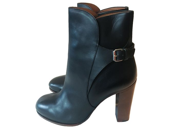 Botines Céline de cuero negro con tacón de madera