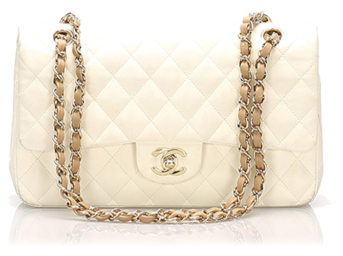 Chanel White Medium Classic Lambskin lined Flap Bag Brown Beige Leather  Metal ref.237974 - Joli Closet