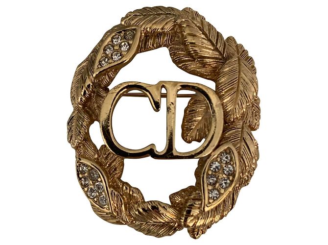 Broche Dior dorée en acier