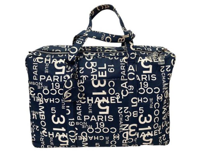 Chanel Bolsa de viaje Azul Lienzo  ref.238371