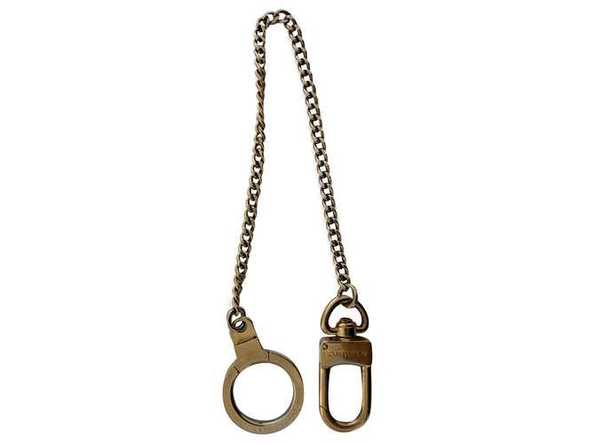 Louis Vuitton Encantos de saco Gold hardware Metal  ref.238803