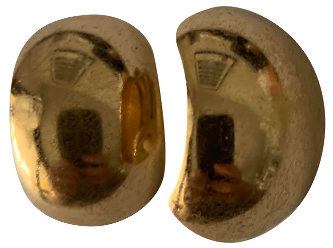 Brincos Dior dourados em aço