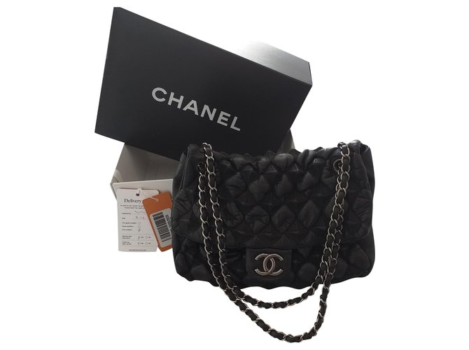 2.55 Chanel chesterfield puffer Black Leather  ref.239020