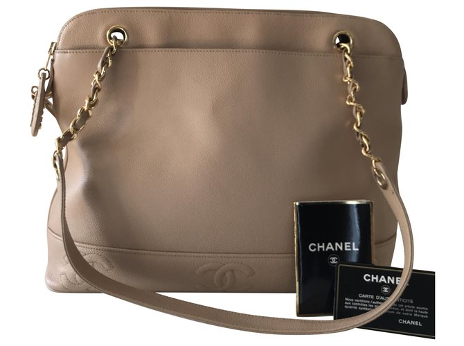 Chanel Handbags Beige Leather  ref.241004