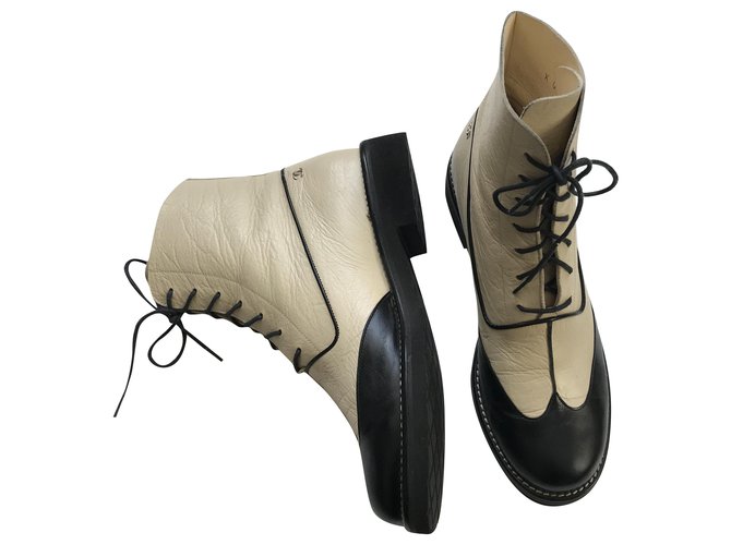 Chanel Combat boots Black Beige Leather Rubber  ref.241559