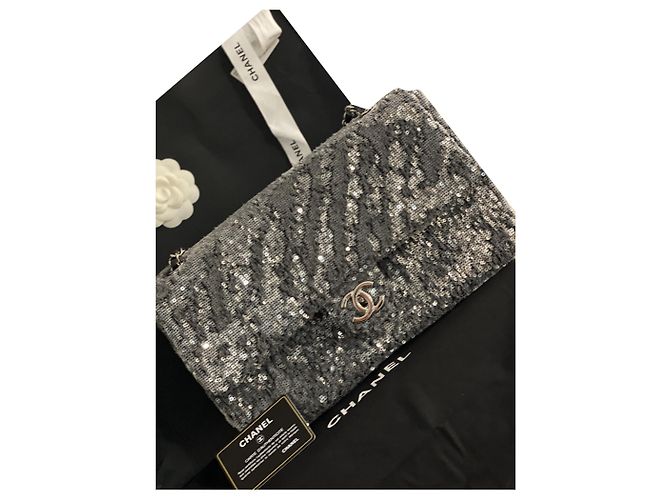 Autre Marque Modelo grande de glitter atemporal Cinza