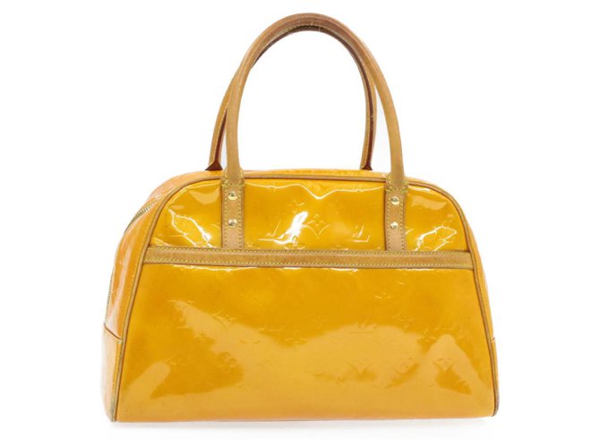 Louis Vuitton Tompkins Square Yellow Patent leather  ref.242390