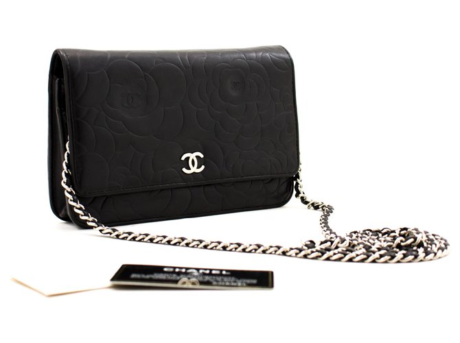CHANEL Black Camellia Embossed Wallet On Chain WOC Shoulder Bag Leather  ref.244196 - Joli Closet