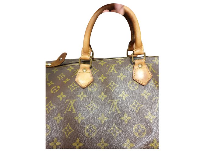 Speedy Louis Vuitton Handbags Brown Cloth Leatherette  ref.245163