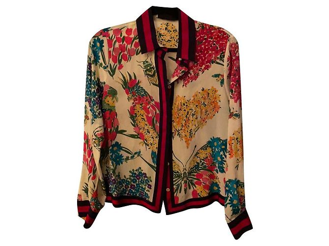 Blusa Gucci in seta con motivi floreali multicolore