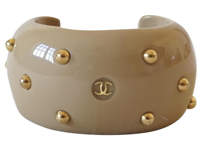 Chanel Armbänder Beige Kunststoff  ref.247388